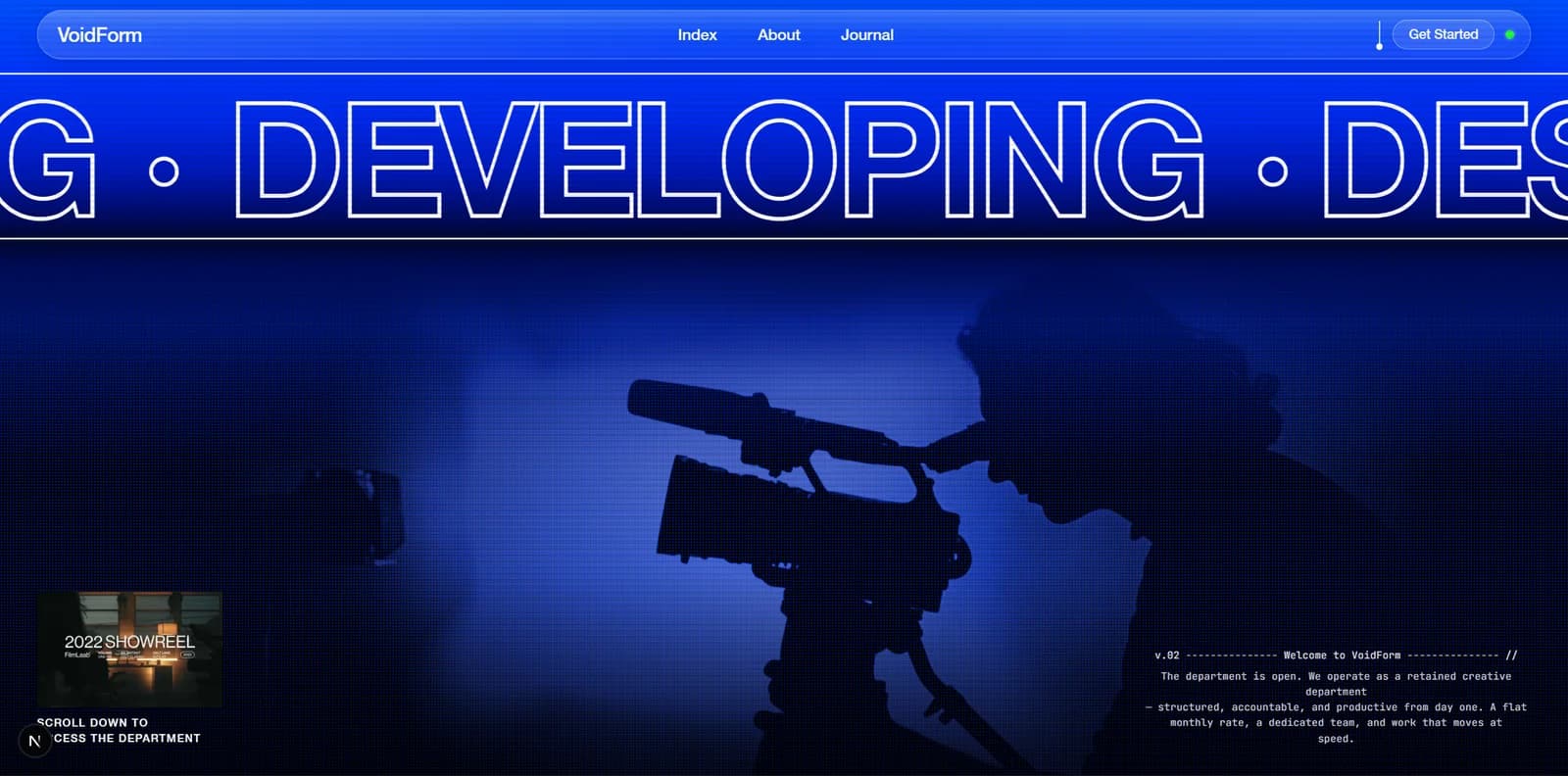 VoidForm website. A blue hero with an outlined 'Developing' marquee running over the silhouette of a film camera.